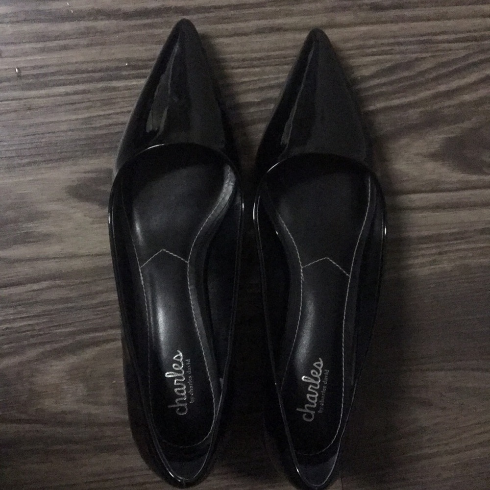 Black patent leather pumps